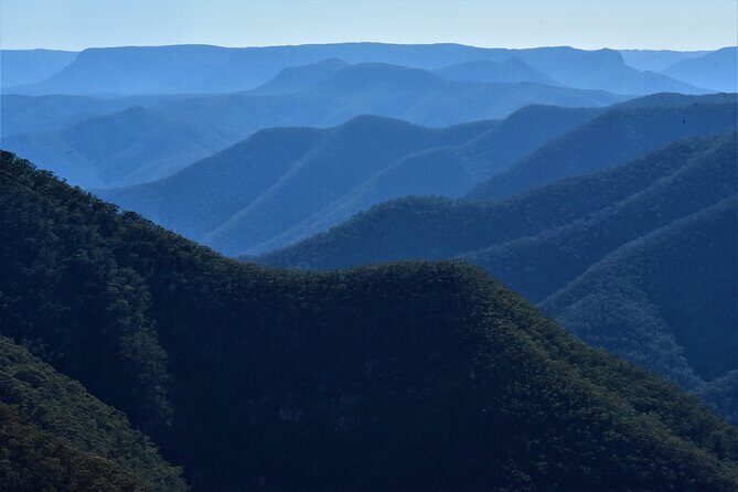 Blue Mountains Day, Sunset Tour & Glow Worms Night Adventure - Sunset Cliff Edge and the Three Sisters Moment