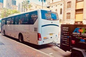Sydney Airport to Sydney CBD shared ride seat in vehicle shuttle transfer - Where to Meet the Shuttle at Sydney Airport