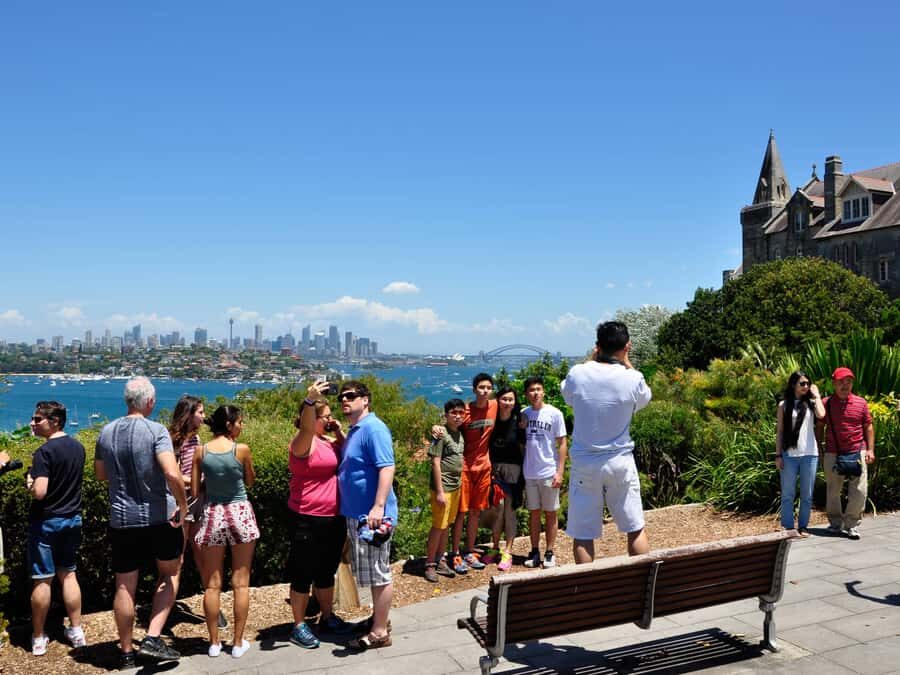 Sydney: City Highlights Guided Bus Tour - Air-conditioned bus + a live English guide that keeps it moving
