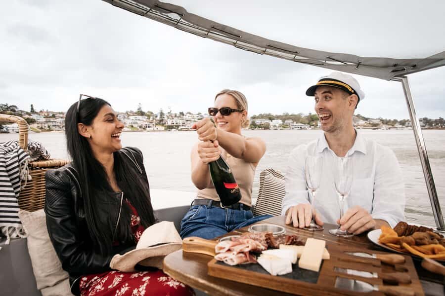 Sydney: Electric Boat Rental from Cabarita Point - The electric picnic boat: quiet power and recycled-material design