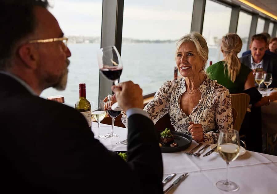 Sydney: Harbour Dinner Cruise with 3, 4 or 6-Course Menu - Views from the dining deck: Opera House, Bridge, and photo-ready lighting